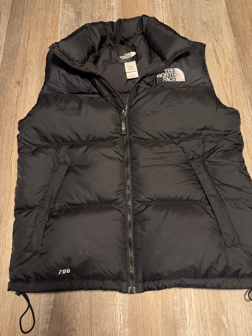 The North Face Black Puffer Vest 700 Insulation with roll up hood
